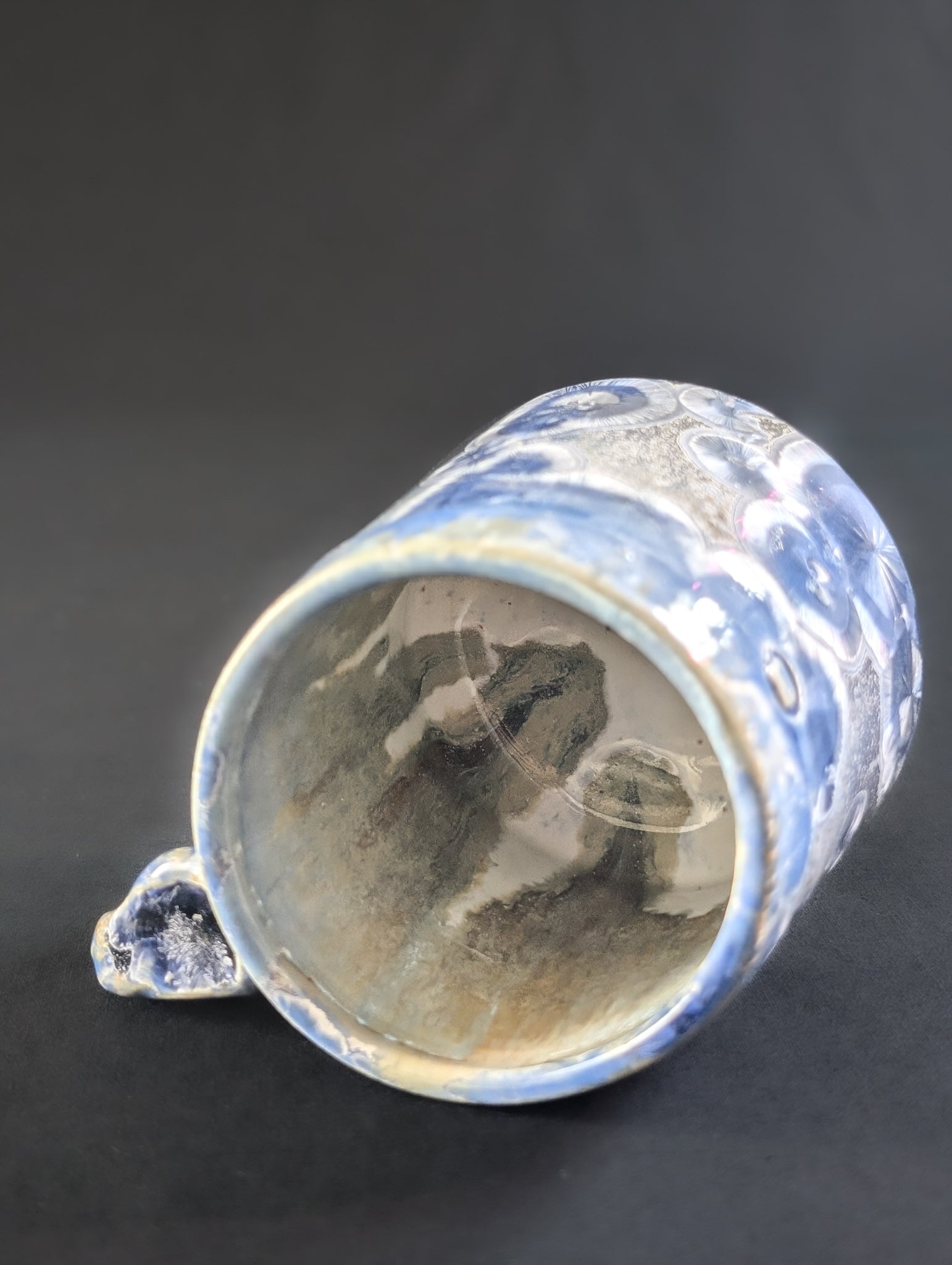 Inside view of Mug ' Dusk Reverie' showing the white liner glaze on the inside.