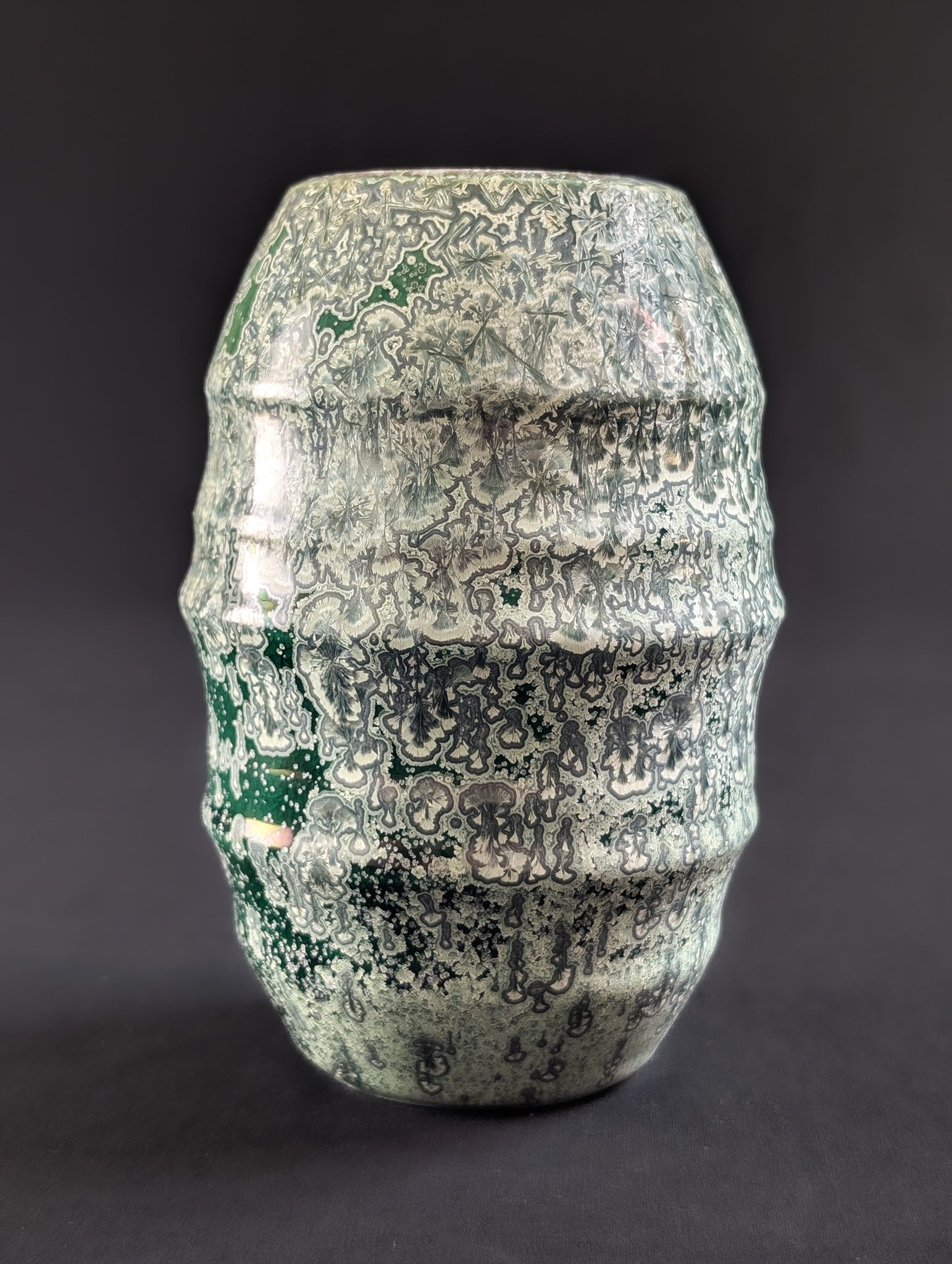 Emerald green crystalline glazed vase by ceramic artist Robbin Harris, featuring silver crystal blooms and softly ribbed form.