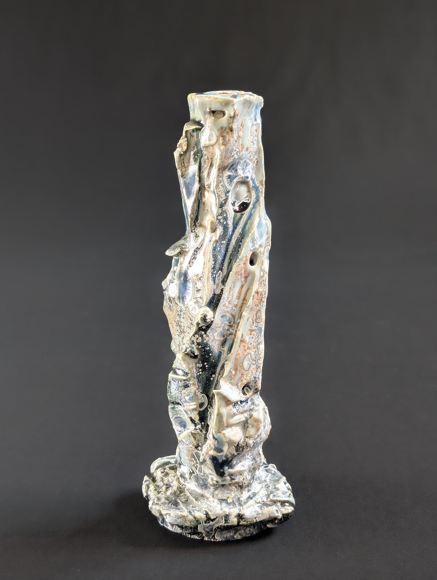 Backside of ceramic sculptural vase by Robbin Harris.