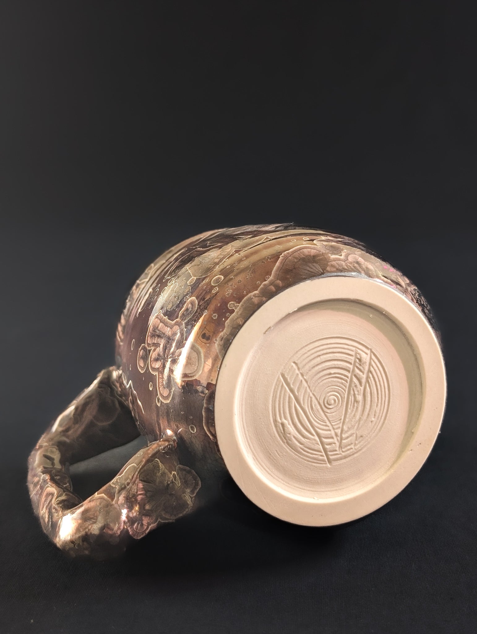 Base of mug 'Ember' showing makers mark by Robbin harris.