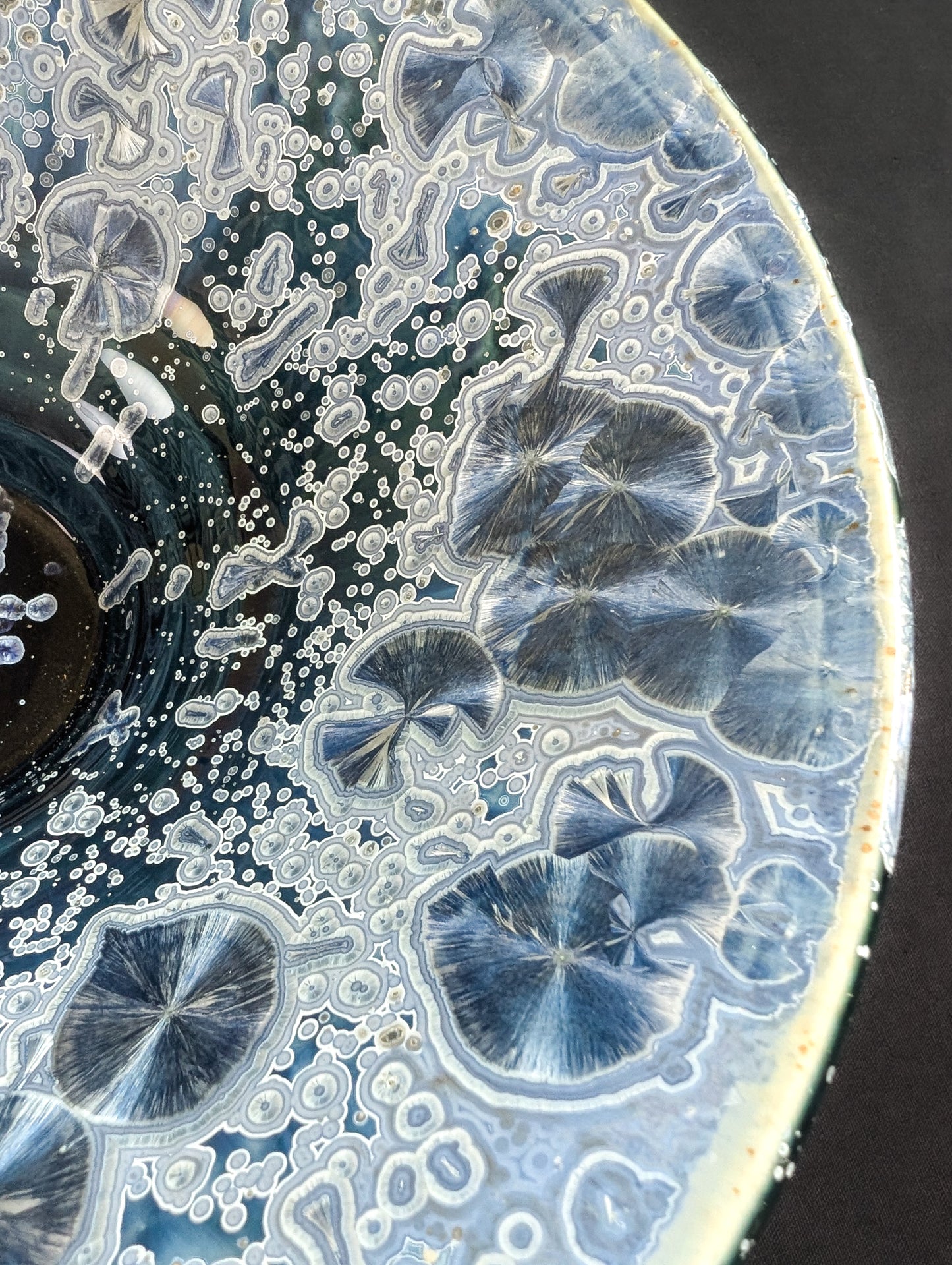 Close up of the rim of a crystalline bowl by Robbin Harris.