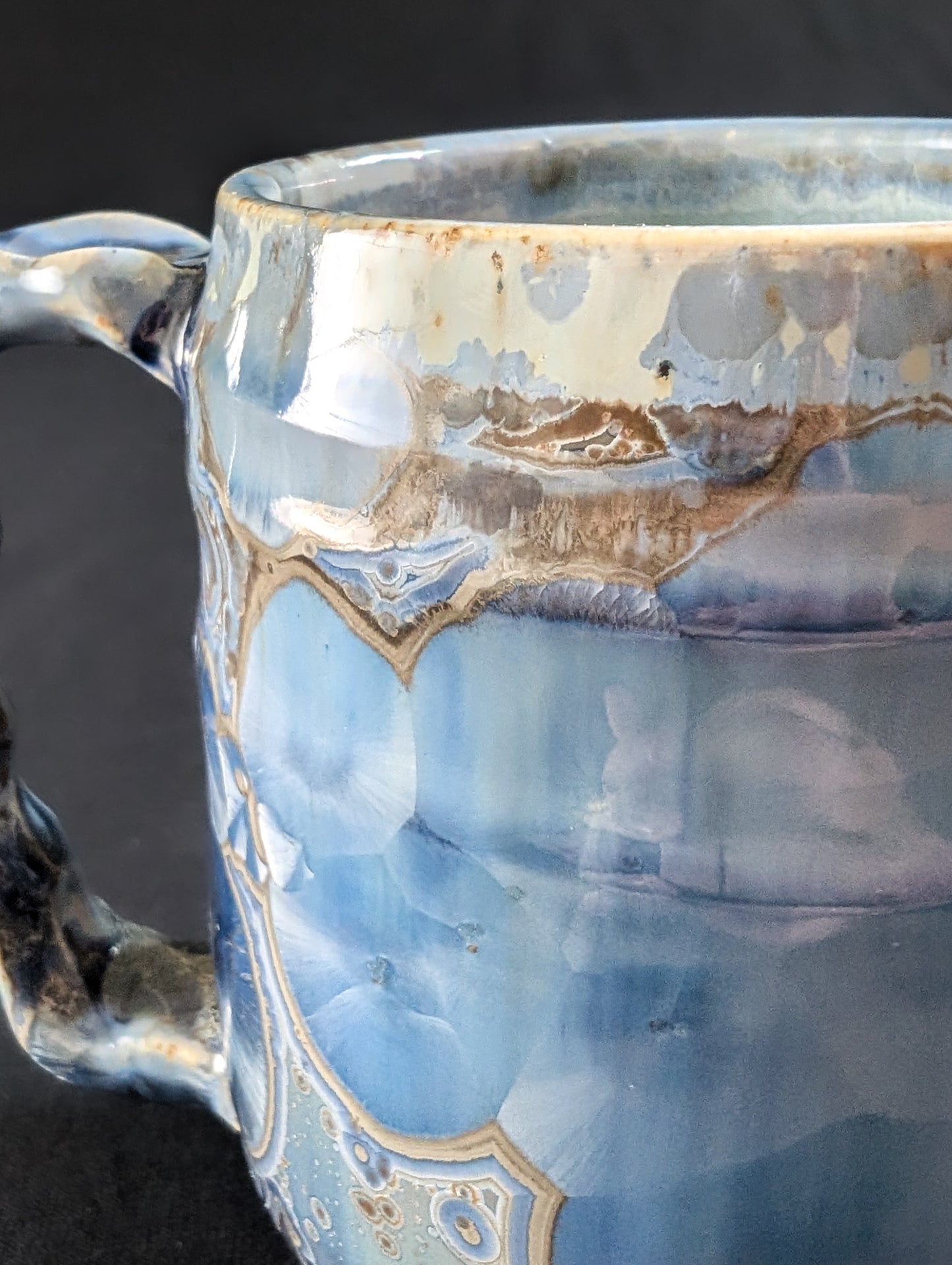 Close-up of the upper rim, showing soft reflections in the glossy glaze.