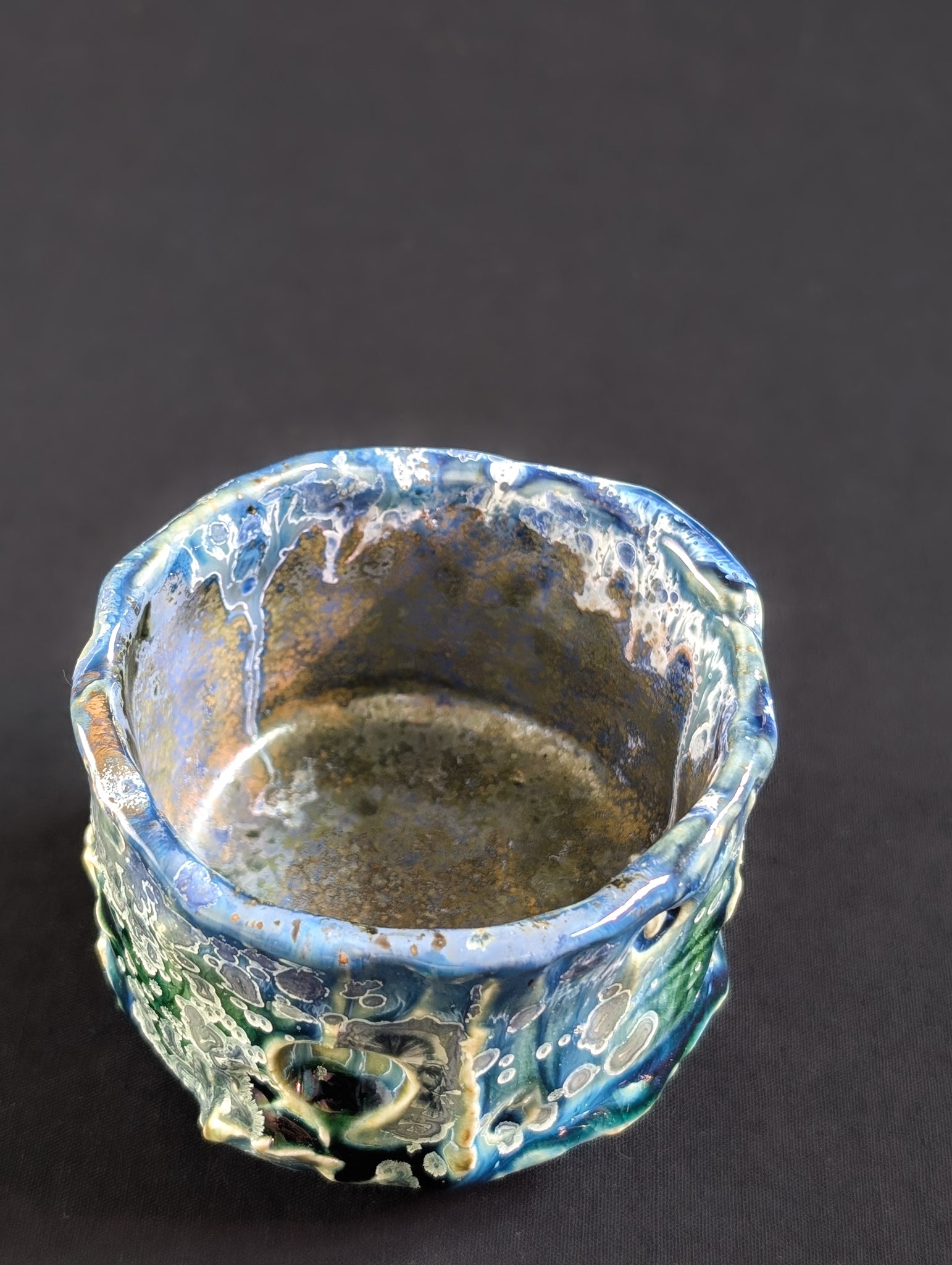 Top view of the 'Rainforest Whisper' chawan, showing the beautiful copper liner glaze.