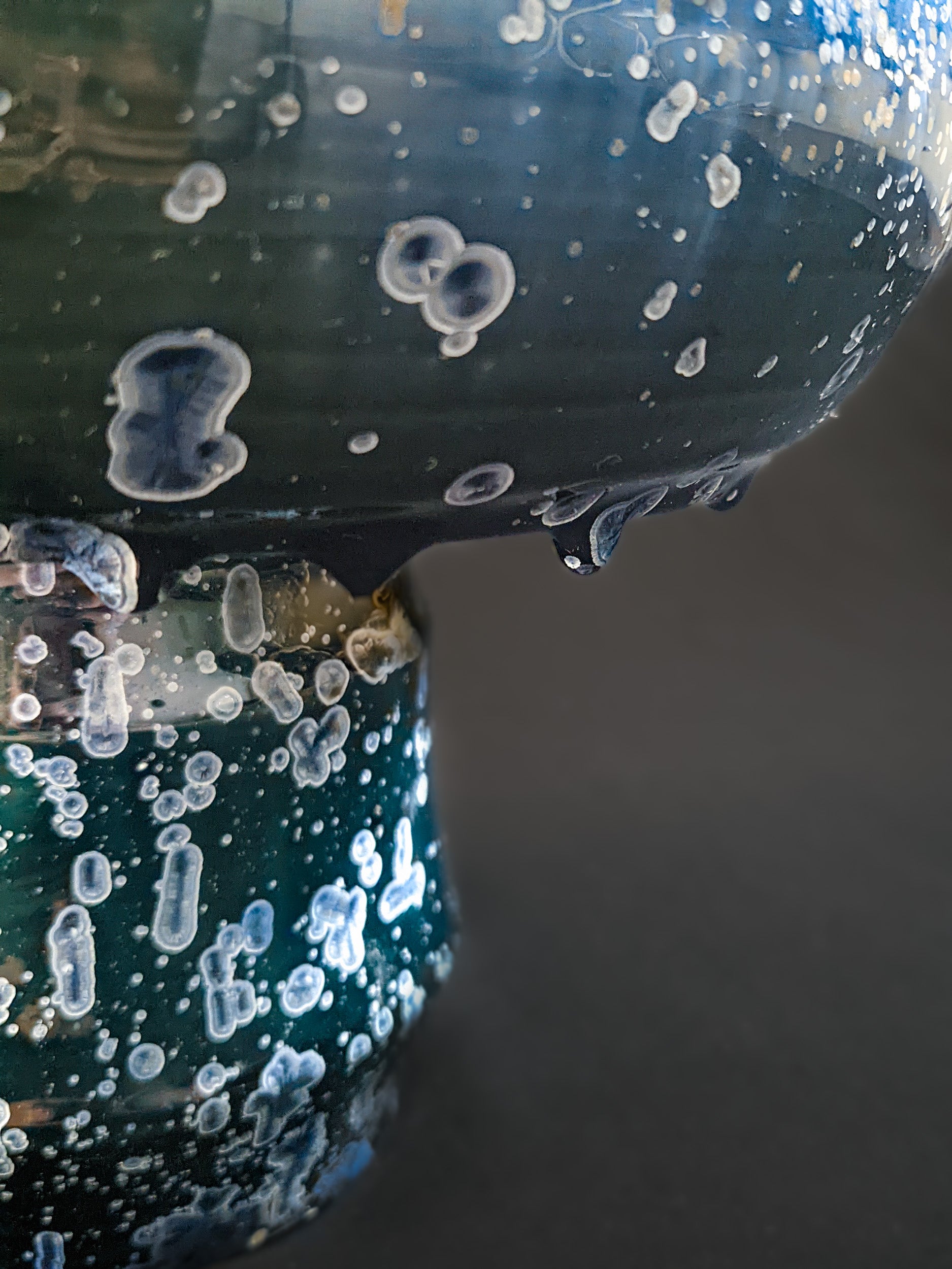 Close-up of glaze drips cascading down Majestic Verdance, adding texture and visual depth.