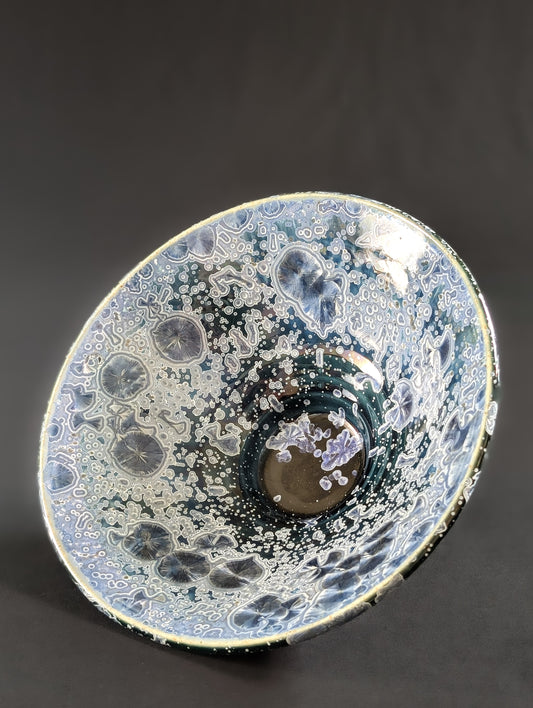 Inside view of crystalline bowl with sapphire blue crystals on the inside.